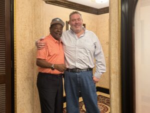 Eliam standing with Tito Fuentes
